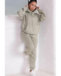 Femme Luxe - Oversized Front Pocket Pullover Hoodie Cuffed Joggers Loungewear Set - Lyst