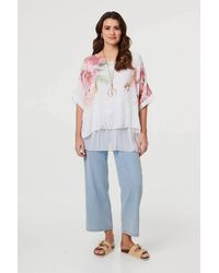Izabel London - Floral 3/4 Sleeve Layered Tunic Blouse - Lyst