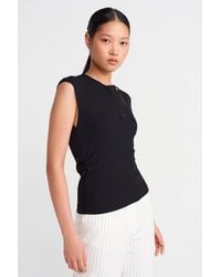 Dilvin - Sleeveless Ribbed Button-Front Blouse - Lyst