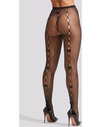 Ann Summers - Crotchless Fishnet Pu Bow Tights - Lyst