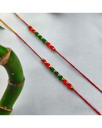 The Colourful Aura - Set Of 2 Of Red Beads Slim Thread Rakhi For Raksha Bandhan - Lyst
