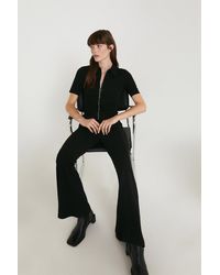Warehouse - Zip Front Flared Jumpsuit - Lyst