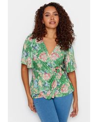 M&CO. - Floral Print Ring Detail Wrap Top - Lyst