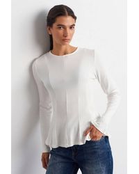 Dilvin - Fitted Textured Knit Peplum Blouse - Lyst