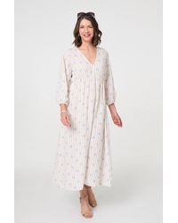 Izabel London - Striped Long Sleeve Empire Maxi Dress - Lyst