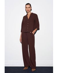 Dilvin - Wide-Leg Crepe Trousers - Lyst