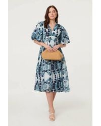 Izabel London - Floral 1/2 Puff Sleeve Tiered Midi Dress - Lyst