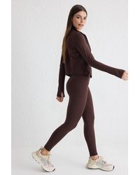 WOVCOR - Reflective Detail Brushed-Fabric Knitted Sports Leggings - Lyst