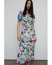 Warehouse - Floral Print Ruched Front Midi Dress - Lyst