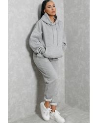 Femme Luxe - Oversized Front Pocket Pullover Hoodie Cuffed Joggers Loungewear Set - Lyst