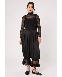 Hell Bunny - Victorian Satin Balloon Leg Trousers With Scallop Lace Trim - Lyst