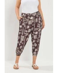 Yours - Floral Cropped Harem Trousers - Lyst