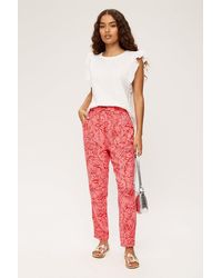 Dorothy Perkins - Petite Pink & Red Palm Print Jogger - Lyst