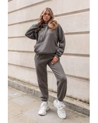Femme Luxe - Oversized Front Pocket Pullover Hoodie Cuffed Joggers Loungewear Set - Lyst