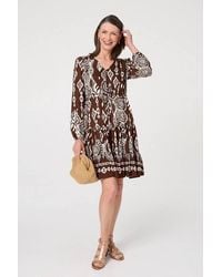 Izabel London - Printed Tiered V-Neck Knee Length Dress - Lyst