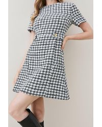 Karen Millen - Mono Tweed Peplum Hem Mini Dress - Lyst