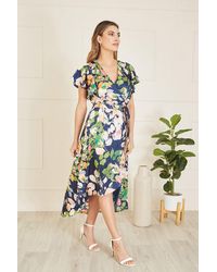 Mela - Navy Floral Satin Wrap Over Midi Dress With Frill Sleeve - Lyst