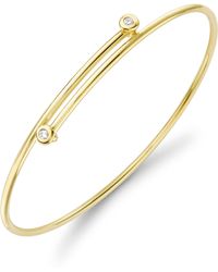 Jewelco London - 18ct Gold Diamond Donut Solitaire Crossover Bangle 1.5mm 5pts - Bgnr02078 - Lyst
