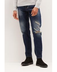 Burton - Tapered Mid Blue Rip Jeans - Lyst