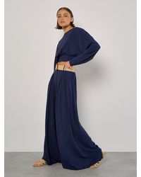 Apricot - Pleated Palazzo Trousers With Belt - Lyst