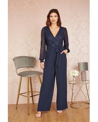 Yumi' - Navy Sequin Jumpsuit With Long Sleeves - Lyst