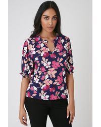 Wallis - Petite Navy Floral Ruched Sleeve Jersey Top - Lyst