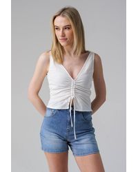 Influence - Sleeveless V-Neck Tie Front Cropped Top - Lyst