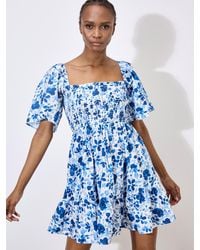 Apricot - Smocked Cotton Floral Mini Dress - Lyst