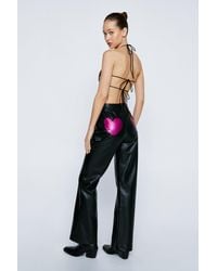 Nasty Gal - Petite Faux Leather Heart Bum Flare Pants - Lyst