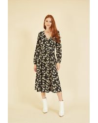 Mela - Black Daisy Print Midi Dress With Long Sleeves - Lyst