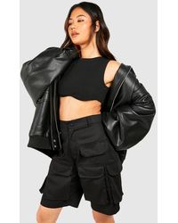 Boohoo - Longline Cargo Faux Leather Look Ring Pull Shorts - Lyst