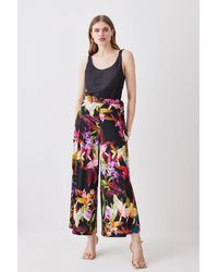 Karen Millen - Floral Print Wide Leg Waist Tie Jersey Trousers - Lyst