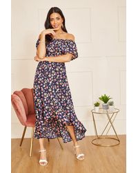 Mela - Navy Bardot Floral High Low Maxi Dress - Lyst