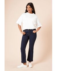 Dorothy Perkins - Petite Comfort Stretch Bootcut Jeans - Lyst