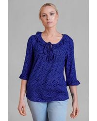 Enorsia - Polka Dot Prints Frill Neck Jersey Blouse - Lyst