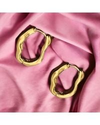 The Colourful Aura - Irregular Wave Oval Hoop Earrings, 1 Inch Stainless Steel - Lyst