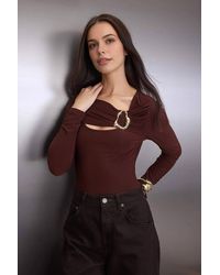 WOVCOR - Fitted Stretch Knit Blouse W/ Cut Out & Hardware Detail - Lyst
