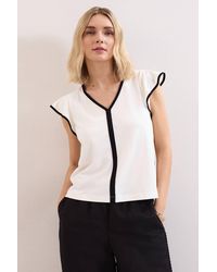 Phase Eight - Fleur Ruffle Sleeve V-Neck Top - Lyst