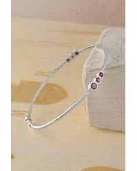 Otis Jaxon London - Triple Stone Garnet & Ruby Birthstone Bangle - Lyst