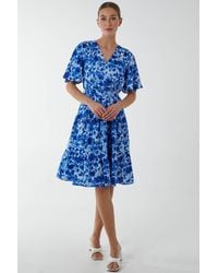 Blue Vanilla - Wrap Front Tier Hem Angel Sleeve Dress - Lyst