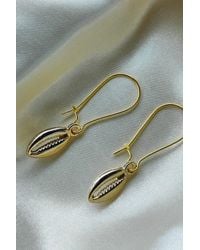 The Colourful Aura - Long Cowrie Sea Shell Charm Dangle Earrings - Lyst