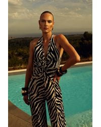 Karen Millen - Zebra Print Wide Leg Jersey Jumpsuit - Lyst