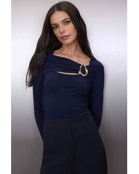WOVCOR - Fitted Stretch Knit Blouse W/ Cut Out & Hardware Detail - Lyst