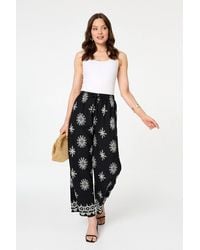 Izabel London - Border Print Wide High Waist Trousers - Lyst