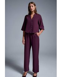Dilvin - Wide-Leg Crepe Trousers - Lyst