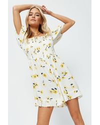 Dorothy Perkins - Petite Yellow Floral Shirred Playsuit - Lyst