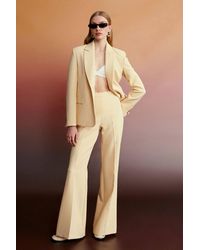 Dilvin - High-Waist Pleated Flare Pants - Lyst