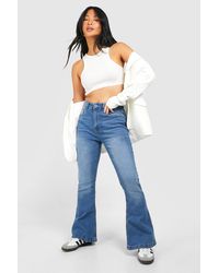 Boohoo - Petite Basics Flared Jeans - Lyst
