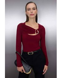 WOVCOR - Fitted Stretch Knit Blouse W/ Cut Out & Hardware Detail - Lyst