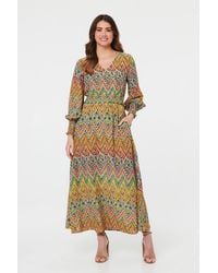 Izabel London - Printed Long Sleeve Shirred Maxi Dress - Lyst